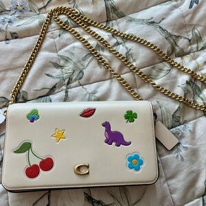 Coach Mila Chalk Crossbody Bag with Sticker Rexy Print and Gold Chain Strap